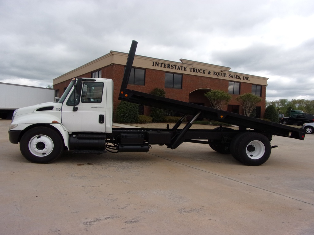 2003 INTERNATIONAL 4300 Flatbed Dump Truck