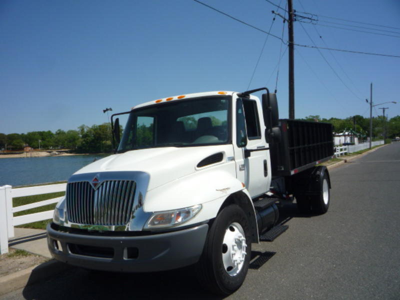 USED 2006 INTERNATIONAL 4300 ROLLOFF TRUCK FOR SALE IN IN NEW JERSEY