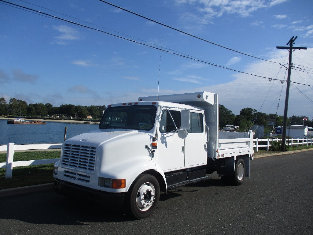 USED 2002 INTERNATIONAL 4700 LP CREW DUMP TRUCK #12187