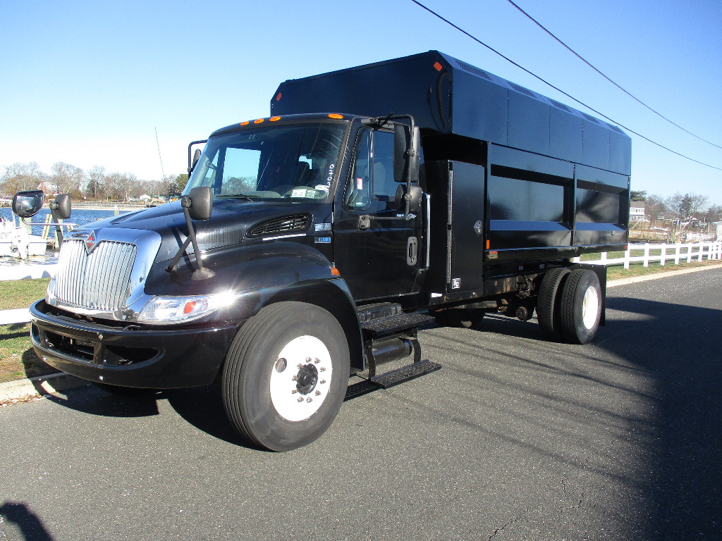 USED 2014 INTERNATIONAL 4300 CHIPPER DUMP TRUCK #12408