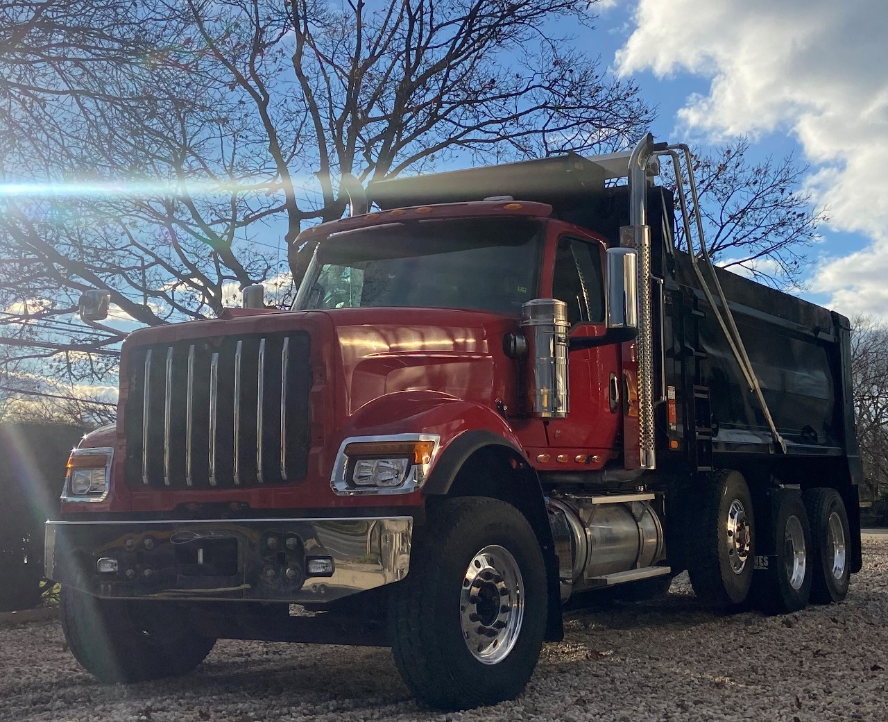NEW INTERNATIONAL HX TRI-AXLE STEEL DUMP TRUCK #1046 NEW INTERNATIONAL HX TRI-AXLE STEEL DUMP TRUCK #1046